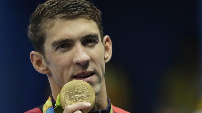 Michael Phelps with the 21st gold medal of his illustrious Olympics career.