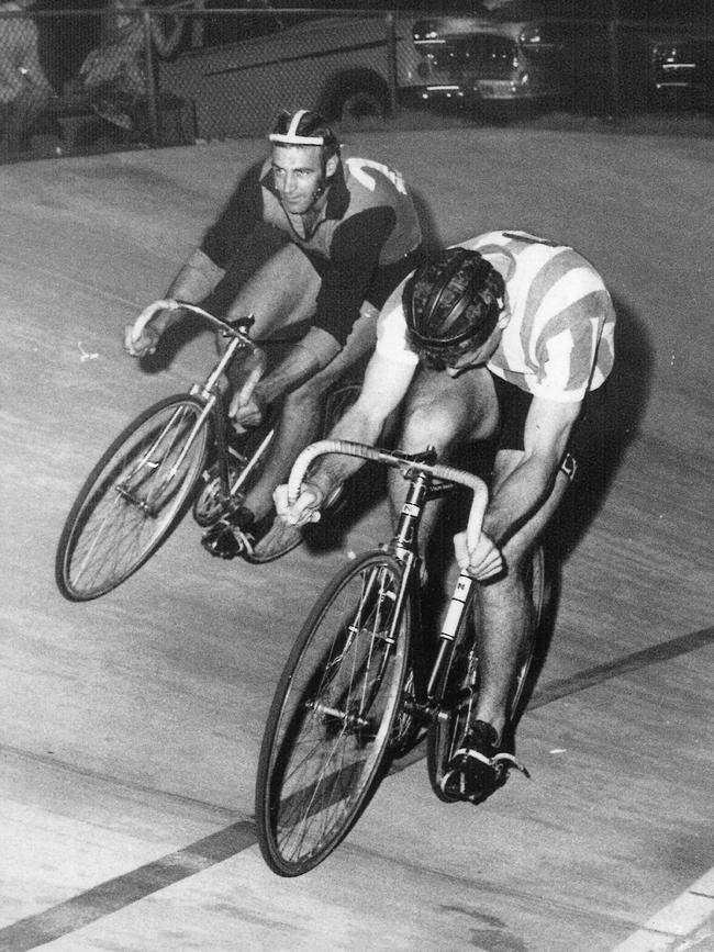 Adelaide Juventus legend Nilo Rusalen (stripes) and Sturt SANFL legend Bob Shearman racing at the defunt Norwood Velodrome in 1965. Picture: supplied.