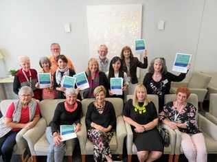 HERE'S TO YOU: Volunteers with their certificates of appreciation at a lunch from Arcare. Picture: Alan Lander