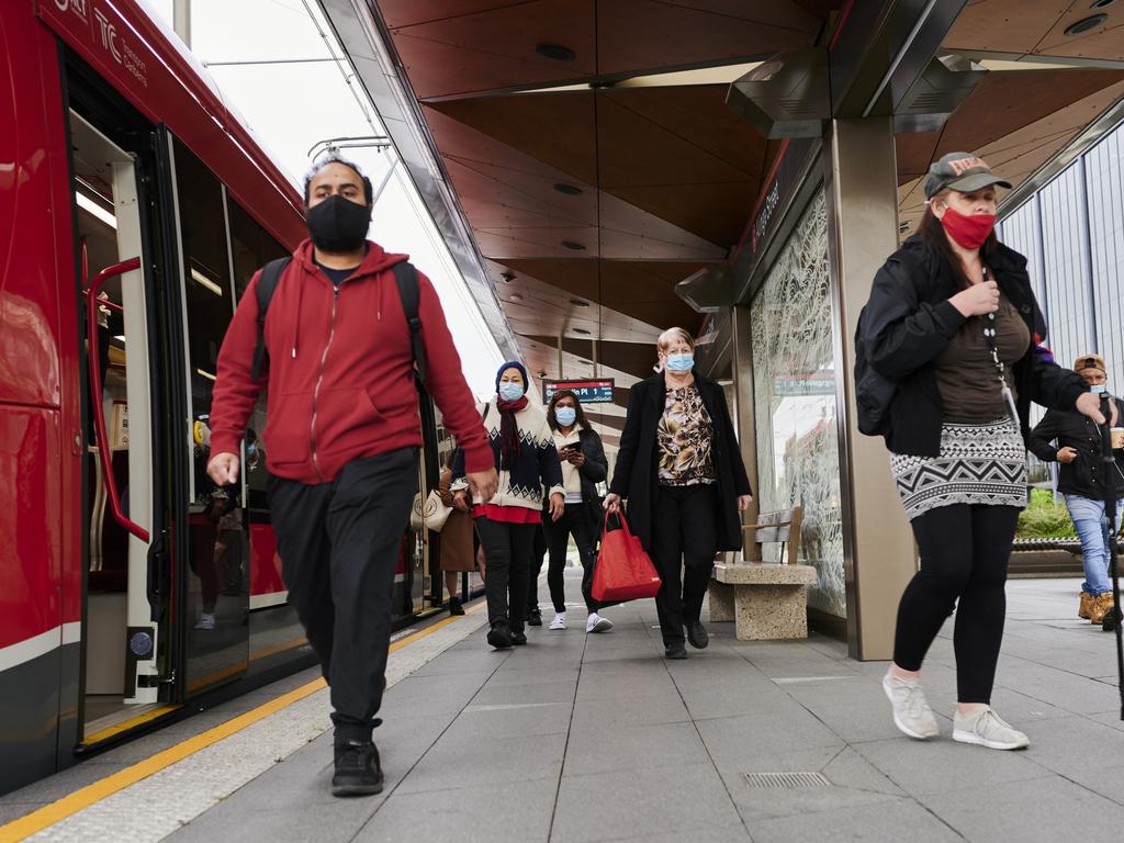Face masks are still required both indoors and outdoors in the ACT. Picture: Rohan Thomson/Getty Images.