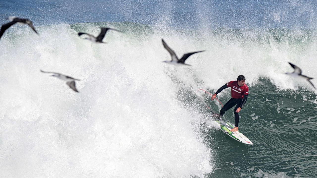 Peru's Lucca Mesinas competes during the men's surfing shortboard bronze medal final of the Pan American Games Santiago 2023 in Chile. Picture: Ernesto Benavides/AFP