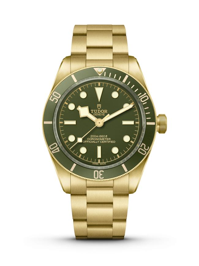 Tudor Black Bay 58 in gold with a green dial.