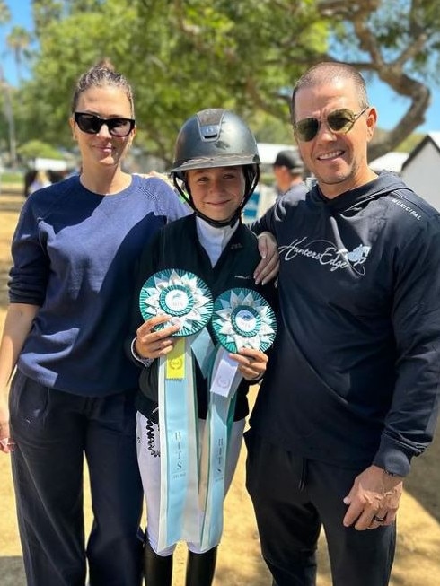 The proud parents with daughter Ella.