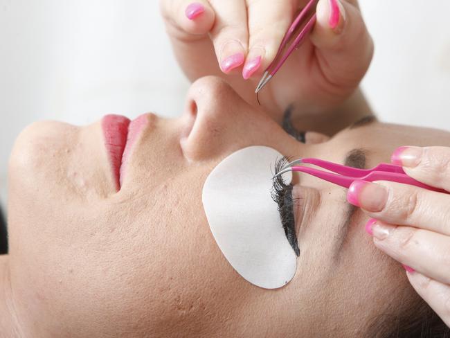 Nikki Earnshaw having silk eyelash extensions put on by owner of B Indulged Jessika Brigginshaw.Photo: Sarah Harvey / The Queensland Times