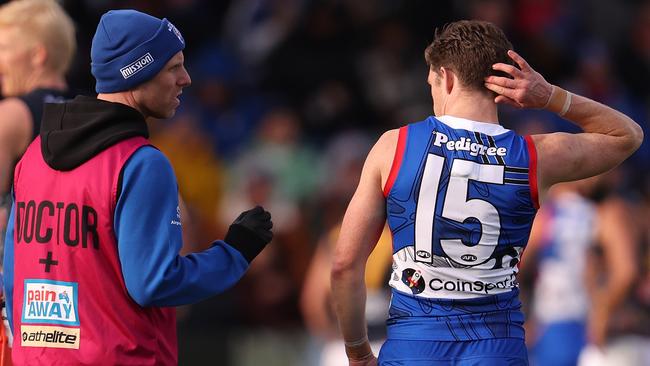 Taylor Duryea is checked by a Bulldogs doctor. (Photo by Robert Cianflone/Getty Images)