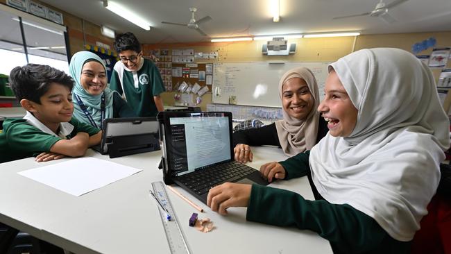 From left, Yahya Ahmed Qureshi, 11, head of primary Iram Khan, Huzaifa Ahmed, 11, teacher Aanisah Buksh and Ariana Malic, 11, at the Islamic School of Brisbane. Picture: Lyndon Mechielsen