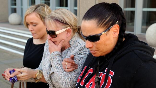 Kieran Loveridge's mother (centre) leaves court in tears after her son's sentence hearing appeal was heard in the Court of Criminal Appeal. Picture: AAP Image/Dean Lewins