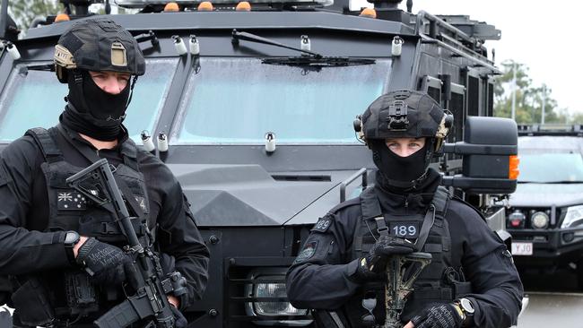 Police at a sod turning ceremony at the Counter Terrorism and Community Safety Centre at Wacol. It has agreed not to blow things up on the weekend after a horse rider was thrown last week. Picture: Liam Kidston