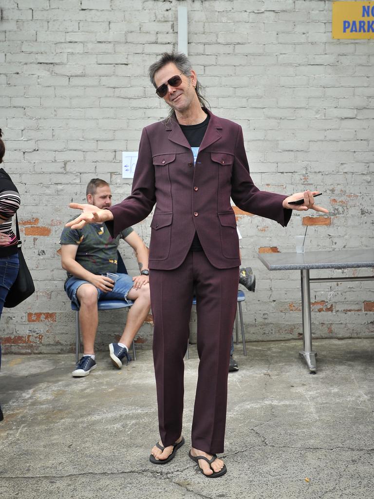 Daniel Pilbeam of Melbourne is seen during Mulletfest, a special event designed to celebrate the hairstyle that's all about business at the front, party at the back, Chelmsford Hotel, Kurri Kurri. (AAP Image/Perry Duffin) 