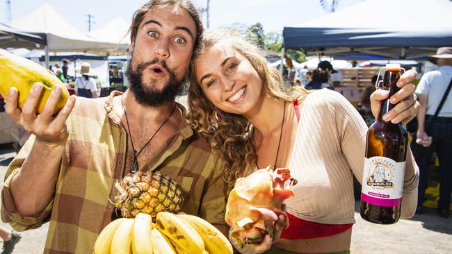 Kadin Rickert and Anna Joerg with fresh fruit from the Toowoomba Farmers Markets, Saturday, January 7, 2023.