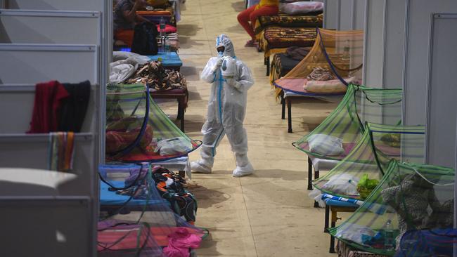 A health worker at a COVID-19 centre in the Commonwealth Games village in New Delhi. Picture: AFP