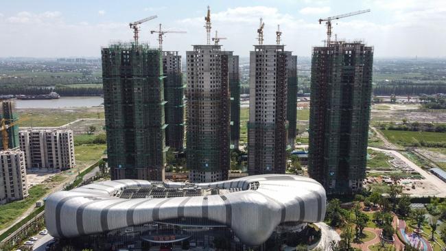 The halted under-construction Evergrande Cultural Tourism City, a mixed-used residential-retail-entertainment development, in Taicang, Suzhou city, in China's eastern Jiangsu province. (Photo by Vivian LIN / AFP)