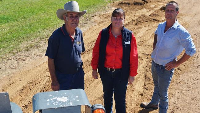 A file photo of Gympie Show Society volunteer John Buckley with show secretary Deb Rowlands and Gympie Grader Hire operator Jason Reker on the trotting track which hasn't been used for trotting for over 15 years. Photo Greg Miller / Gympie Times