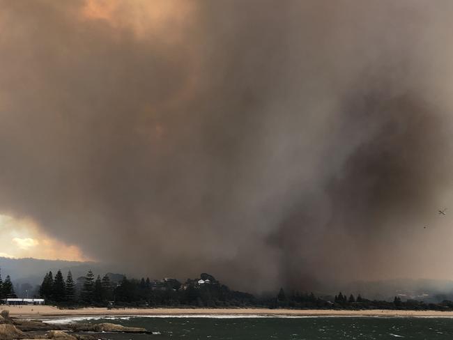 The seaside town of Tathra has been devastated by a huge blaze. Picture: AFP Photo/David Porter