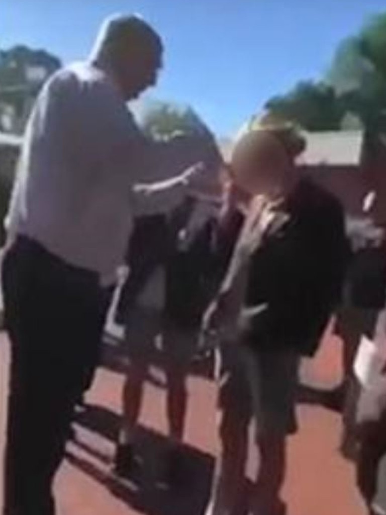 Trinity Grammar deputy Rohan Brown cutting a students hair in 2018.