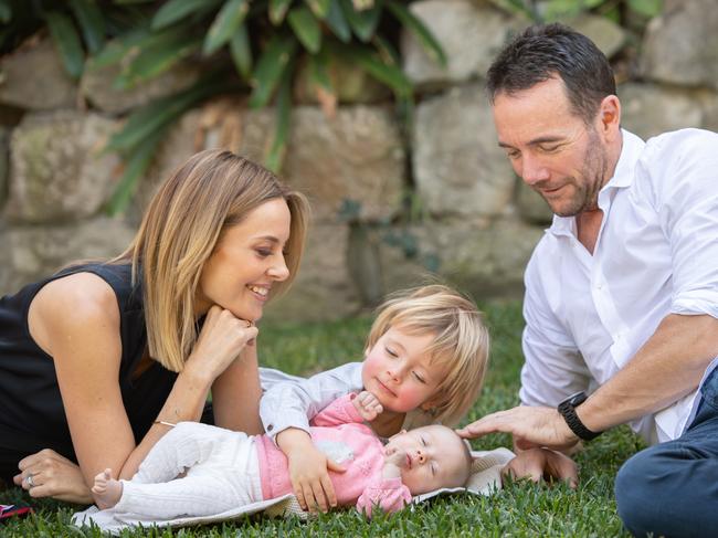 Allison Langdon, Mike Willesee pose for a photo with their children, baby Scout and Mack, 2 at their home in Bronte. (AAP IMAGE / MONIQUE HARMER)