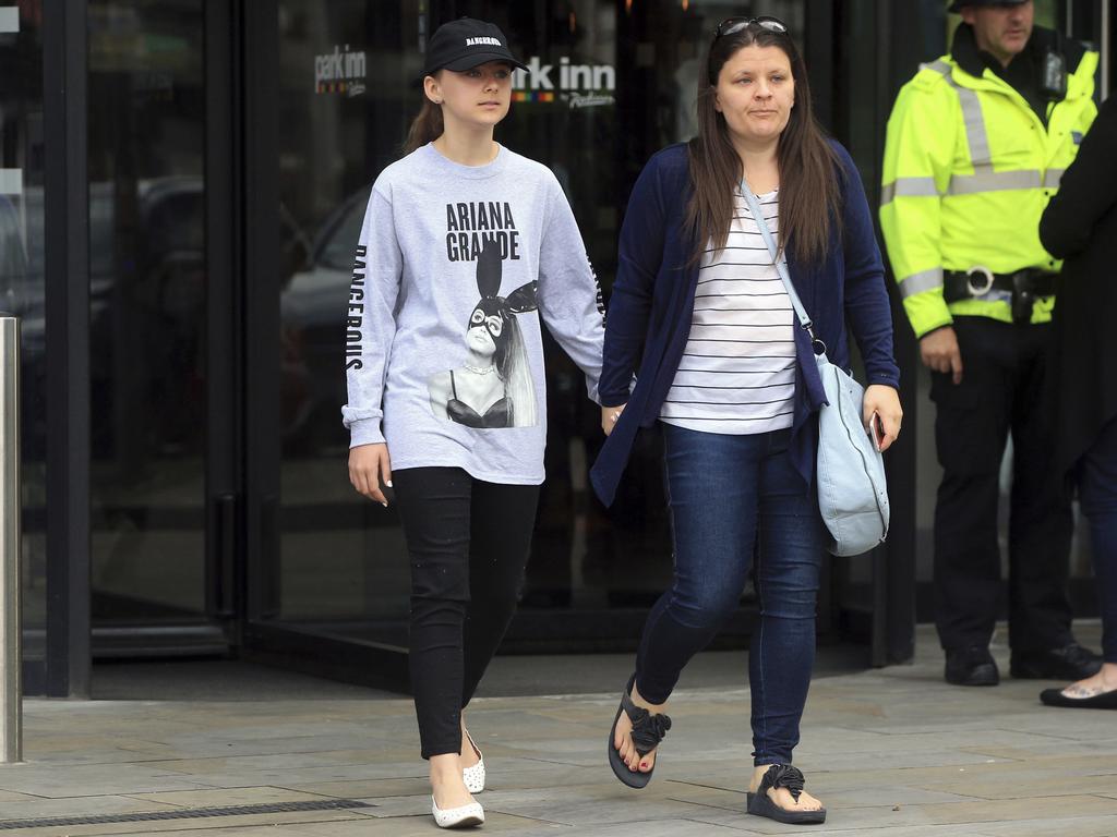 Mother and daughter, who attended the concert in Manchester leave the Park Inn hotel, May 23, 2017. Picture: AP