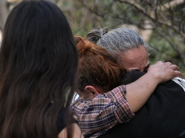 Relatives of victims react near the site of a fire in a residential building in Istanbul. Picture: AFP