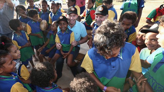 Tony Abbott met with school children when he was prime minister with Indigenous Affairs Minister Nigel Scullion during his visit to Cape York in August 2015. Picture: AAP