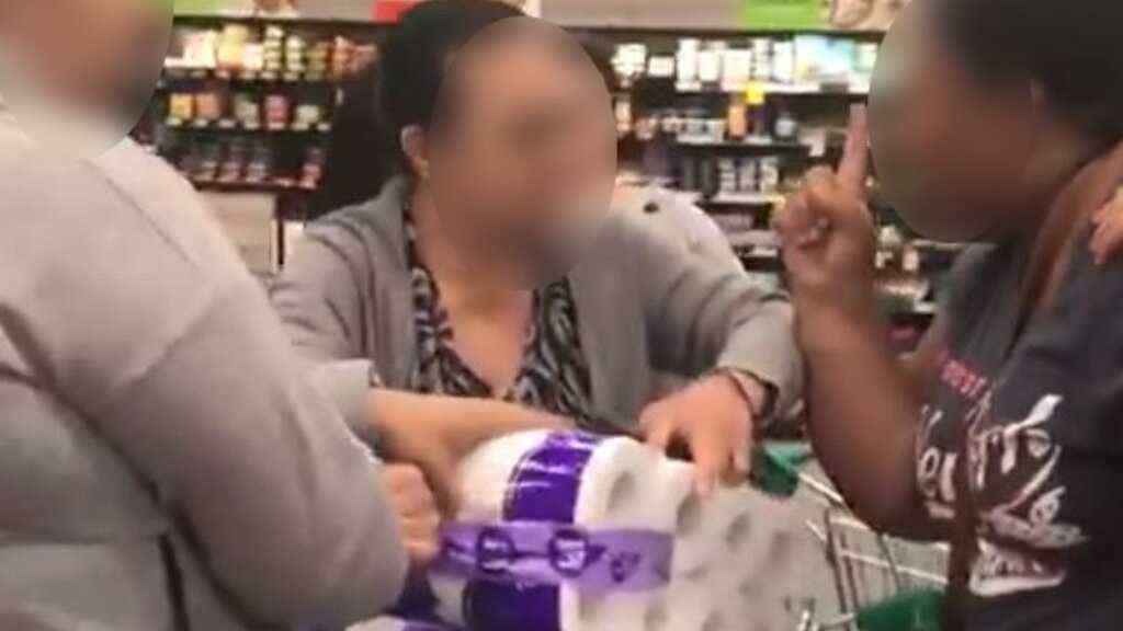 Two women were arrested over a shopping incident at a Woolworths.