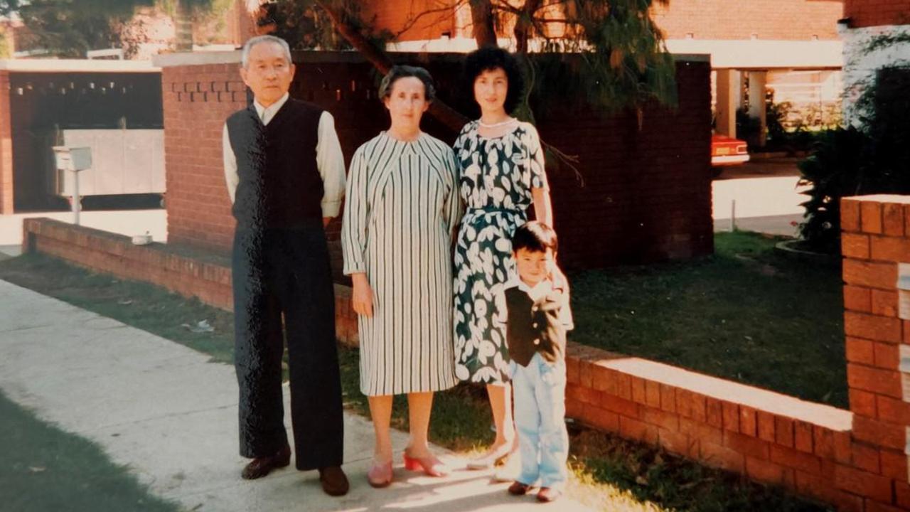 Bruce outside the Cabramatta government-supplied housing as a child. Picture: Supplied