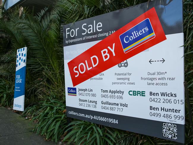 SYDNEY, AUSTRALIA  - Newswire Photos  AUGUST 08 2023: A view of the a property for sale with a sold stocker across the sign on the Northern Suburbs of Sydney. Australiaâs building approvals have slumped to their lowest level in almost three years as soaring interest rates and surging material cost hammer demand for new housing. In the 2022-23 financial year, building approvals plunged by 18 percent, with just 176,000 new dwellings approved in the 12 month period.  Picture NCA Newswire/ Gaye Gerard