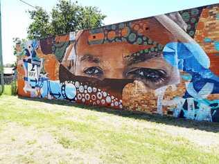 FAMOUS FACE: Murgon mural by artists Kane Brunjes and Bronte Naylor. Picture: Olivia Everitt