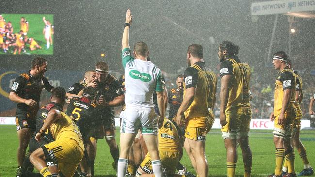 Chiefs players celebrate a try.