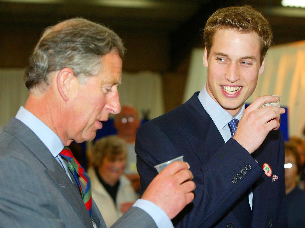 Prince William (R) and his father, then Prince Charles, sample beer together in 2003. Picture: Supplied