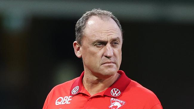 SYDNEY, AUSTRALIA - MARCH 23: John Longmire, Senior Coach of the Swans looks on during the round two AFL match between Sydney Swans and Essendon Bombers at SCG, on March 23, 2024, in Sydney, Australia. (Photo by Mark Metcalfe/AFL Photos/via Getty Images )