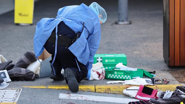 Police at the scene of Mr Whenuaroa’s stabbing. Picture: Nigel Hallett