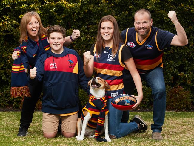 The Ward family, Cindy, Luke, 13, Amber, 15, Dave and Rosie the dog are excited about the upcoming finals series. <b>Picture: AAP Image/MATT LOXTON</b>