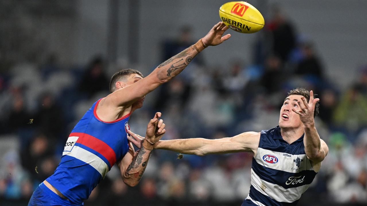 Rory Lobb (left) comprehensively beat Geelong superstar Jeremy Cameron (right) in only his fourth game as a defender on Saturday night. Picture: Daniel Pockett / Getty Images