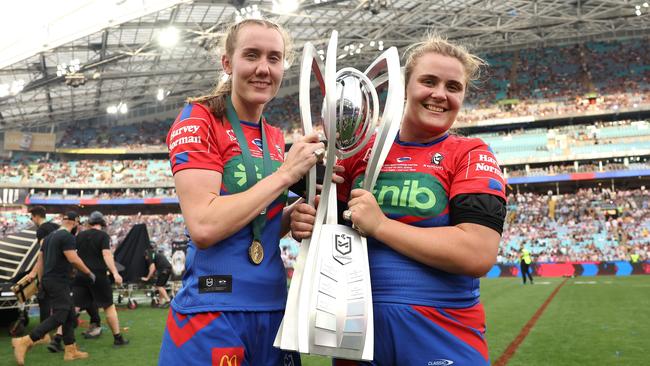 SYDNEY, AUSTRALIA - OCTOBER 01: Tamika Upton and Hannah Southwell of the Knights poses with the Premiership Trophy after winning the 2023 NRLW Grand Final match between Newcastle Knights and Gold Coast Titans at Accor Stadium, on October 01, 2023, in Sydney, Australia. (Photo by Matt King/Getty Images)