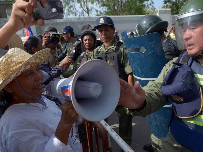 Cambodian rights activists protest the latest plan to pay Cambodia $40 million to take asylum seekers by the end of the year.