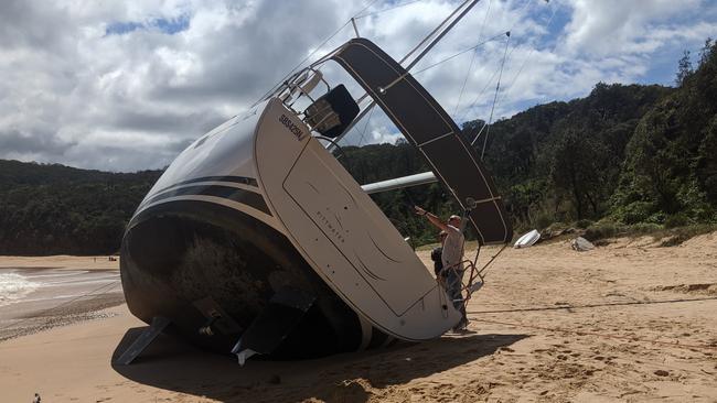 The Hanse yacht became a tourist attraction for a week before it was refloated. Picture: Mark Westfield