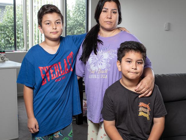 22nd January 2023. The DailyTelegraph. News.Rosehill, Sydney, NSW, Australia.Pics by Julian Andrews.Portraits of Hassinah Dadyar and her sons Sami (11) and Osman (9) pictured in their Rosehill apartment.Housing crisis in Western Sydney case study. Hassinah is a single mum whose rent is going up in May and fears she'll be unable to pay.