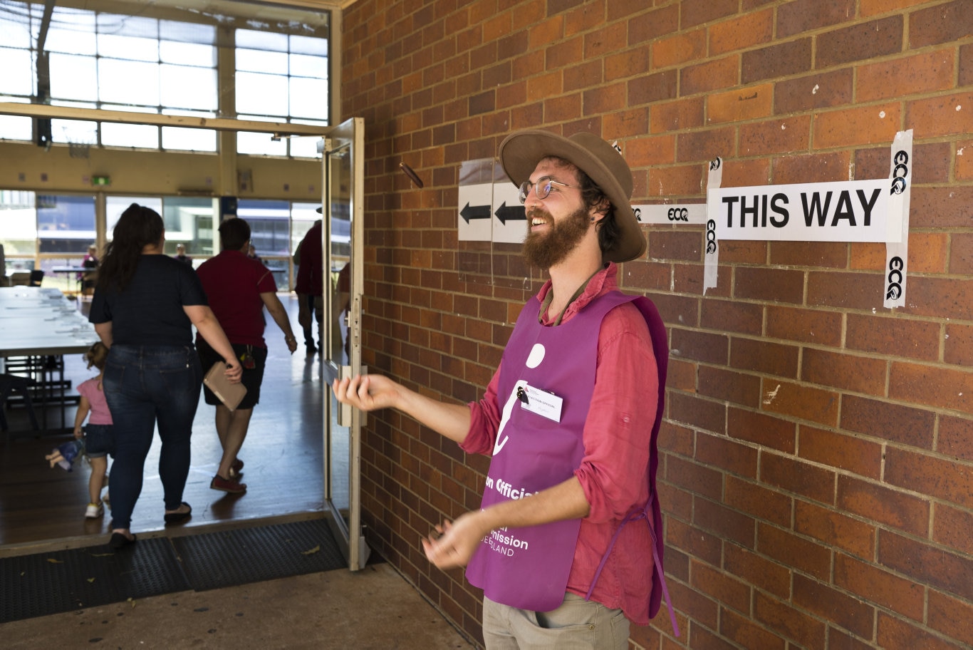 ECQ official Ayden Roberts juggles seeds while waiting to greet voters at a quiet Centenary Heights State High School polling booth on Toowoomba Regional Council local government election day, Saturday, March 28, 2020. Picture: Kevin Farmer