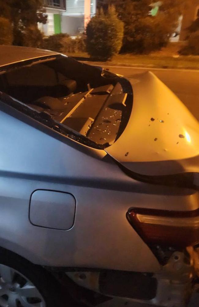 A car in Coolum Beach was found damaged after a hit-and-run, with the driver allegedly fleeing the scene. Photo: Lewis Jaenke