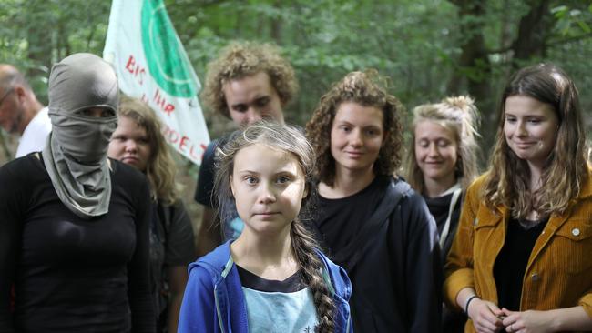 Swedish teenage climate campaigner Greta Thunberg with fellow climate activists from the German ‘Fridays for Future’ movement.