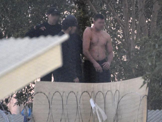 Detainees climbed onto the roof during last month’s riot. (AAP Image/Bianca De Marchi)