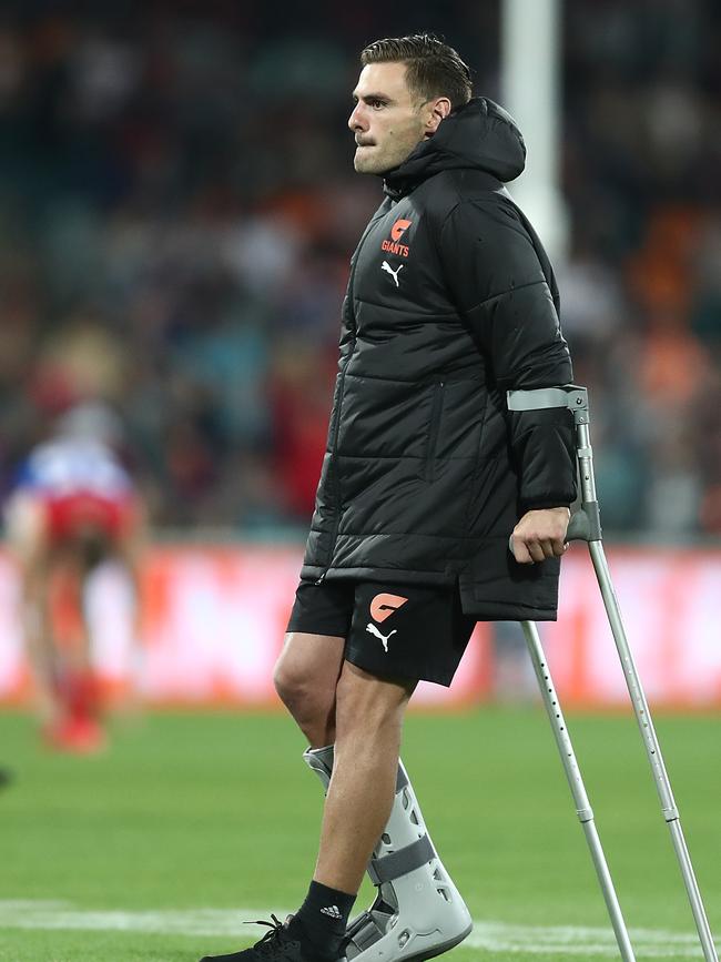 Coniglio in a moon boot after being injured last season.