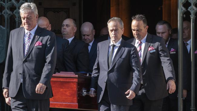 Bill Shorten, centre, carries the coffin of Kimberley Kitching from St Patricks Cathedral on Monday. Picture: David Geraghty.