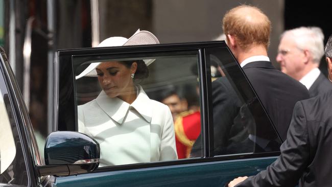 The couple departed separately from other royals back to Windsor. (Photo by Hollie Adams / AFP)