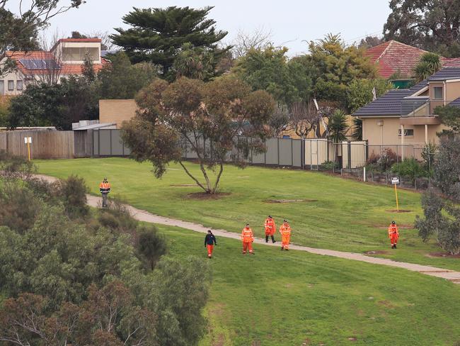 SES search park land near the Maribyrnong River behind the Ristevski's house. Picture: Hamish Blair