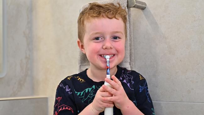 Five-year-old Hamish Thorpe practices his tooth brushing technique at home in Cairns. Picture Emily Barker.