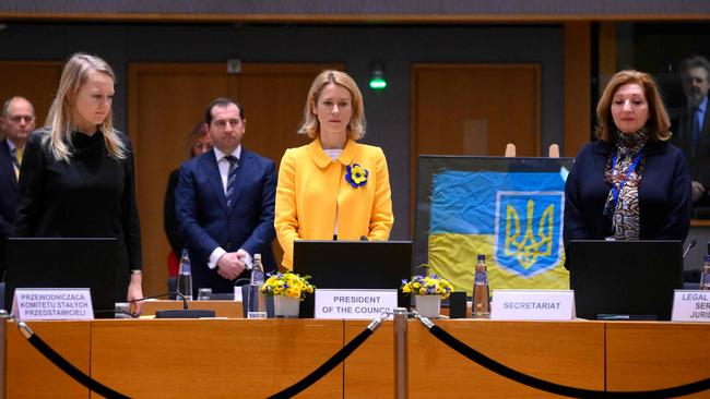 European Union High Representative for Foreign Affairs and Security Policy Kaja Kallas (C) observes one minute of silence to mark the third anniversary in Brussels. Picture: AFP