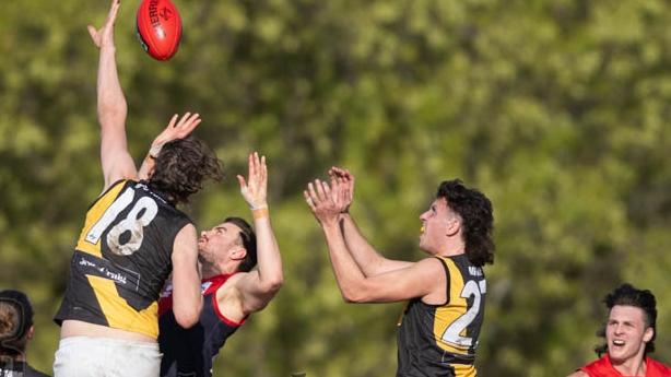 Tom Lovell (left) spoils an opponent on Saturday. Picture: 11 Shades Photography