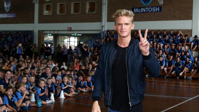 Popstar Cody Simpson, 19, made a surprise visit to his old school, All Saints Anglican School, on the Gold Coast. Pics Adam Head