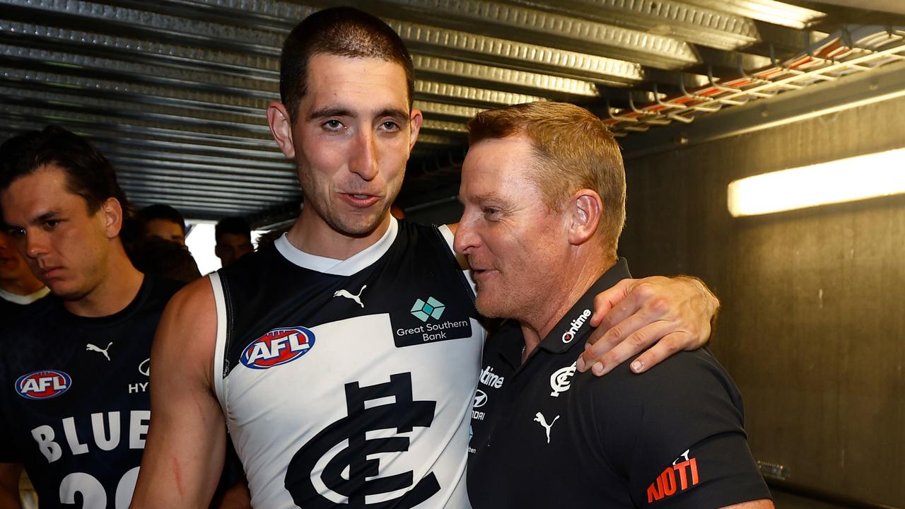 Blues coach Michael Voss (right) says vice-captain Jacob Weitering is fit to face Geelong after playing out the GWS match in pain last week. Picture: Michael Willson / Getty Images